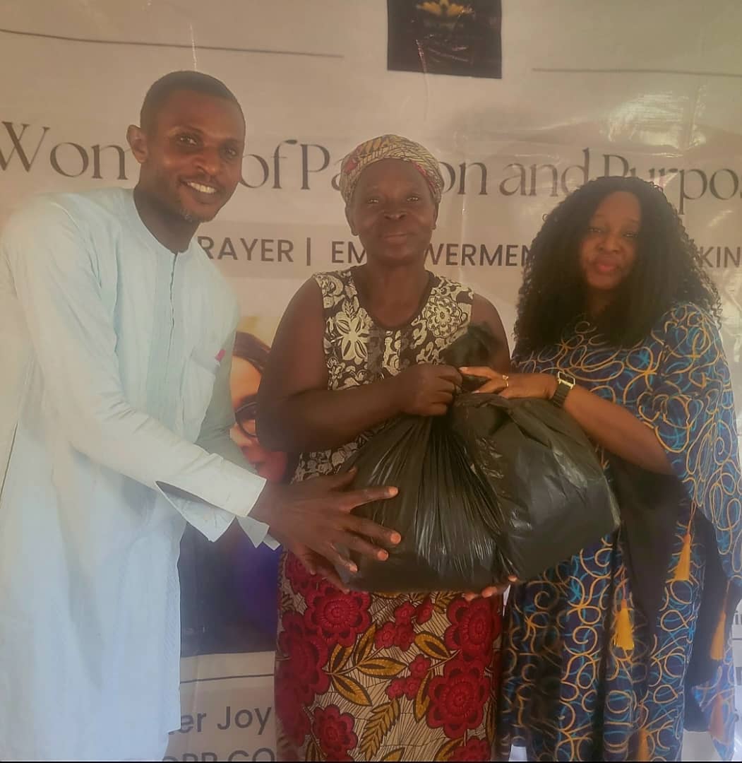Min. John Godfrey, along side a member of Mopp/Wopp with the Global Office Administrator Gladys Joshua, at the empowerment Program 2025